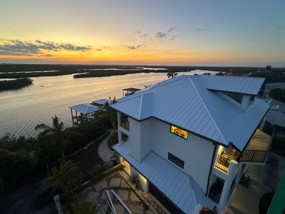 Slide of Tip Top Roofing