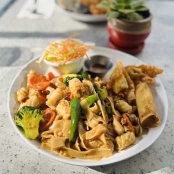 Spices Thai Kitchen - a plate of noodles and vegetables - Thai Near Me - San Diego, California Spices Thai Kitchen - a plate of noodles and vegetables - Thai Near Me - San Diego, California