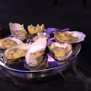 Deluxe Fun Dining - BAKED DELUXE OYSTERS - Bars Near Me - Charlotte, North Carolina Deluxe Fun Dining - BAKED DELUXE OYSTERS - Bars Near Me - Charlotte, North Carolina