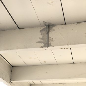 Semper Solaris - Silicone dripping from the roof holes. - Solar Installation Near Me - Hayward, California Semper Solaris - Silicone dripping from the roof holes. - Solar Installation Near Me - Hayward, California