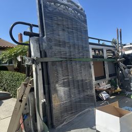 Arrival of a pair of iron gates.