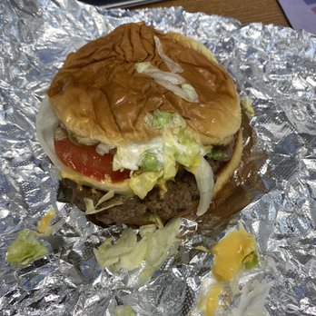 Mickey's - a hamburger on aluminum foil - Pizza Near Me - Beckley, West Virginia