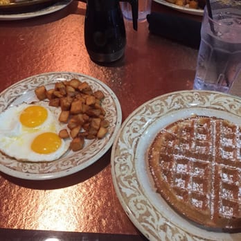 Another Broken Egg Cafe - My fish: the waffle and the eggs and potatoes - Breakfast & Brunch Near Me - Houston, Texas