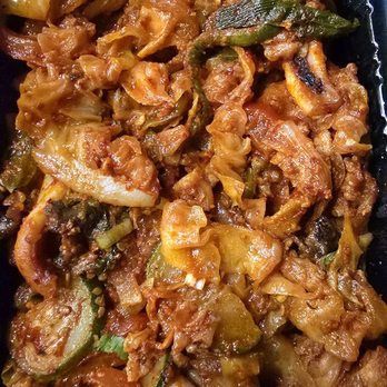 Rolly Kimbab - Spicy Pork, Squid, and Bulgogi. Everything is really tender, with a delicious medium spicy flavor. Some vegetables in there also. - Korean Near Me - Bayside, New York