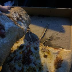 Socios Pizza-Pasta - Deep dish pizza and a Stromboli