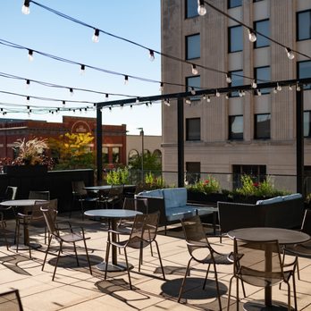 Dive - tables and chairs on a rooftop patio - Cocktail Bars Near Me - Eau Claire, Wisconsin Dive - tables and chairs on a rooftop patio - Cocktail Bars Near Me - Eau Claire, Wisconsin