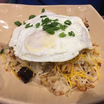 Snooze, an A.M. Eatery - Spuds Deluxe with Sausage Gravy, Bacon and eggs over medium - PERFECT every time! :) - Breakfast & Brunch Near Me - Katy, Texas Snooze, an A.M. Eatery - Spuds Deluxe with Sausage Gravy, Bacon and eggs over medium - PERFECT every time! :) - Breakfast & Brunch Near Me - Katy, Texas