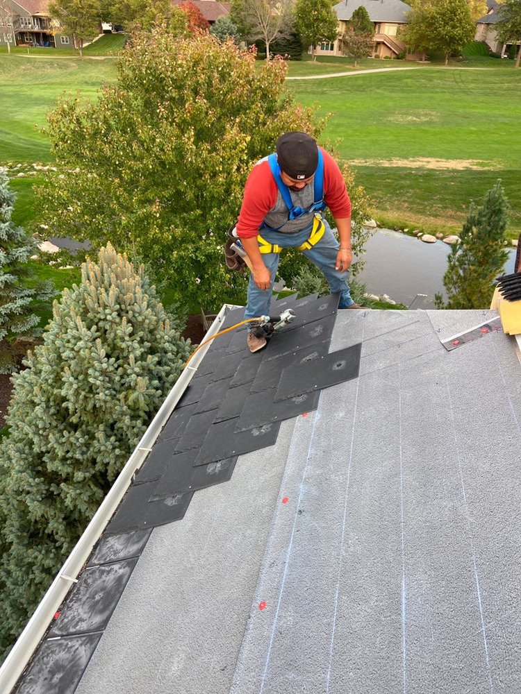 Slide of Roofing Service Company