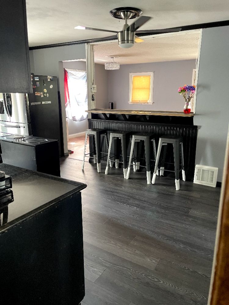 Slide of Black Brothers Flooring and More