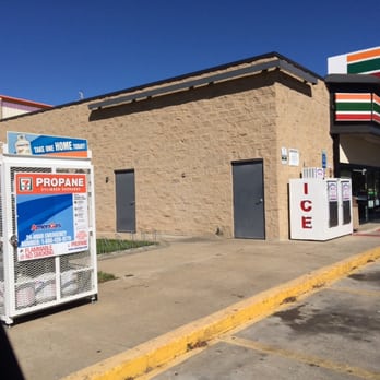 7-Eleven - a gas station with a vending machine in front of it - Convenience Stores Near Me - Dallas, Texas