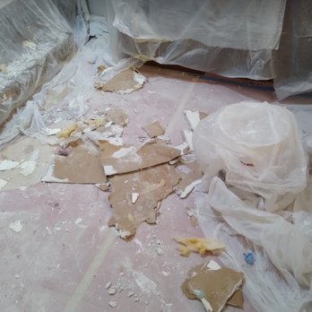 Solid Roofing - damage from roof leak-skylight installed using sheetrock and not sealed correctly - Roofing Near Me - Freeport, Florida