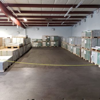 101 Building Supply - a large warehouse with pallets and boxes - Flooring Near Me - West Sacramento, California 101 Building Supply - a large warehouse with pallets and boxes - Flooring Near Me - West Sacramento, California