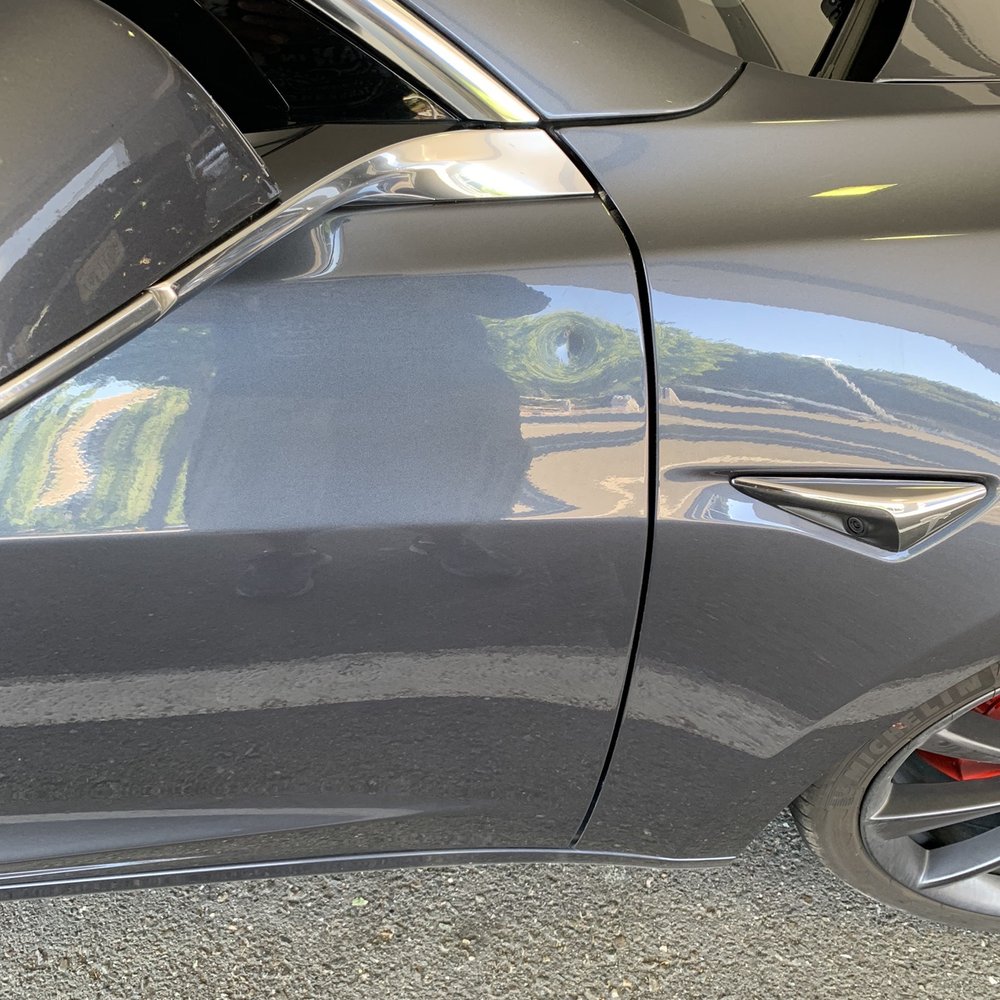 Tracy Collision - 1.5'in dent in the aluminum door panel - Body Shops Near Me - Tracy, California Tracy Collision - 1.5'in dent in the aluminum door panel - Body Shops Near Me - Tracy, California