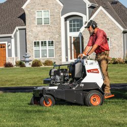 Johns Tractor Works & Equipment - Bobcat-ae30 ride-on aerator
