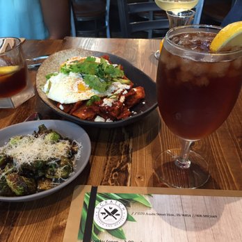 Scratch Kitchen - Chilaquiles, warmed brussels + reggiano, shangri-la berry iced tea - Breakfast & Brunch Near Me - Honolulu, Hawaii Scratch Kitchen - Chilaquiles, warmed brussels + reggiano, shangri-la berry iced tea - Breakfast & Brunch Near Me - Honolulu, Hawaii