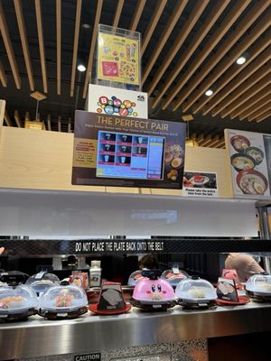 Kura Revolving Sushi Bar by null