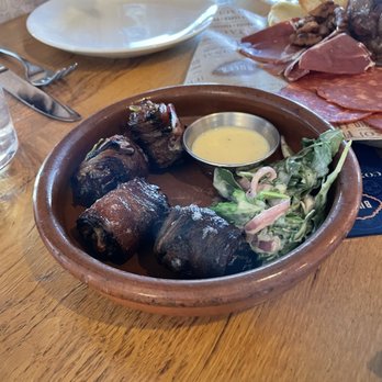 Bulla Gastrobar - Chorizo stuffed dates - Spanish Near Me - Plano, Texas Bulla Gastrobar - Chorizo stuffed dates - Spanish Near Me - Plano, Texas