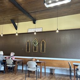 two people sitting at a table two people sitting at a table