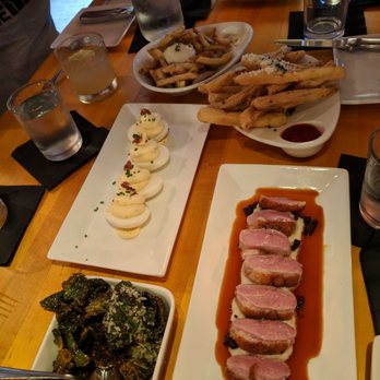 Salty Sow - Deviled eggs, duck, brussel sprouts, eggplant fries, duckfat fries - American Near Me - Austin, Texas Salty Sow - Deviled eggs, duck, brussel sprouts, eggplant fries, duckfat fries - American Near Me - Austin, Texas