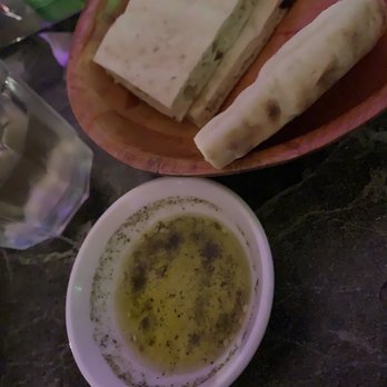 Lulu Mediterranean - Complimentary fresh warm bread and seasoned EVOO - Mediterranean Near Me - Edgewater, New Jersey