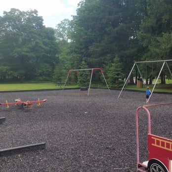 Watnong Park - Blue zip line, Yellow rings, 4 person seesaw, tire swing, swings - Parks Near Me - Morris Plains, New Jersey Watnong Park - Blue zip line, Yellow rings, 4 person seesaw, tire swing, swings - Parks Near Me - Morris Plains, New Jersey
