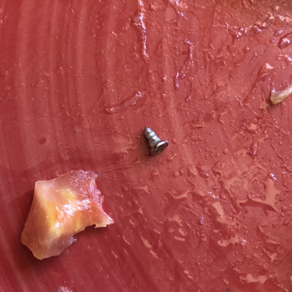 A closer picture of the screw that was left in a Papa Murphy's pizza that I've been to that is hurting my tooth A closer picture of the screw that was left in a Papa Murphy's pizza that I've been to that is hurting my tooth