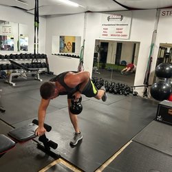 Get Fit Maryville - 1 arm KB row with leg extension