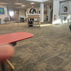 PNC Bank - The guy in the front is Rude he is playing with his phone and laughing very not professional