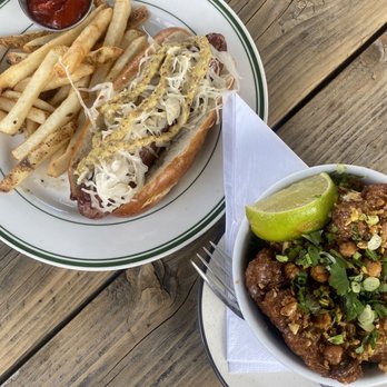 Künstler Brewing - Brat with bun and fries. Curry Cauliflower (half size) - Brewpubs Near Me - San Antonio, Texas Künstler Brewing - Brat with bun and fries. Curry Cauliflower (half size) - Brewpubs Near Me - San Antonio, Texas