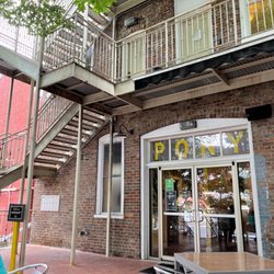 The Golden Pony - Outside patio with shade and a cool breeze.