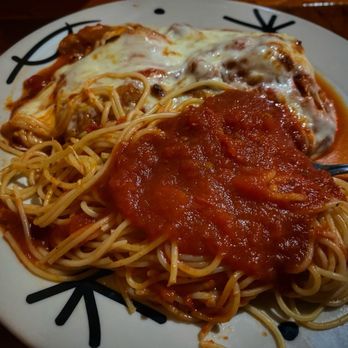 Sages West Bay Bistro - Eggplant Parmesan   Layers of Eggplant baked and topped with Mozzarella Cheese, with a Side of Pasta (spaghetti) - Italian Near Me - Largo, Florida