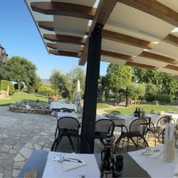 Pizzeria Euganeus - Outdoor seating area. Warm in summer but delightful.