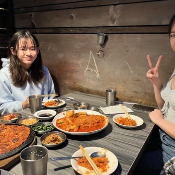 Thang Thang - two women sitting at a table with food - Korean Near Me - San Diego, California Thang Thang - two women sitting at a table with food - Korean Near Me - San Diego, California