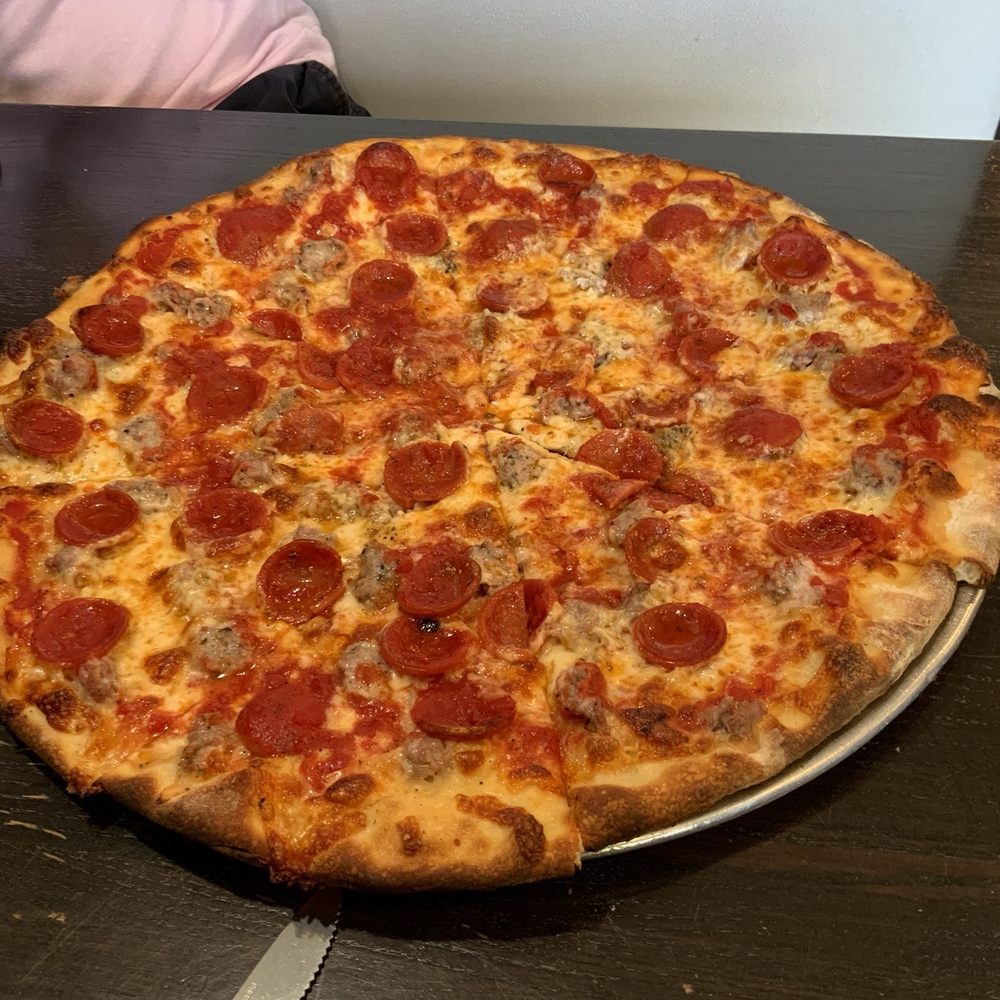 The perfect pepperoni and sausage pizza. Cooked to absolute perfection. The perfect pepperoni and sausage pizza. Cooked to absolute perfection.