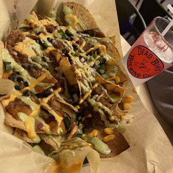 Dead Bird Brewing - Half order of the loaded nachos - Brewpubs Near Me - Milwaukee, Wisconsin Dead Bird Brewing - Half order of the loaded nachos - Brewpubs Near Me - Milwaukee, Wisconsin