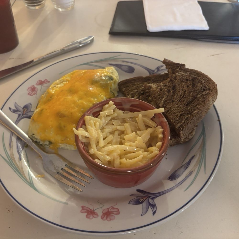 Jalapeño Popper Omelette. Sooo goood.  Hash Brown casserole n rye toast.