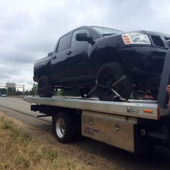 Jiffy Lube - My truck being towed after ceasing in the middle of I-5. My oil and transmission fluid drained profusely after being serviced. - Oil Change Stations Near Me - Tacoma, Washington Jiffy Lube - My truck being towed after ceasing in the middle of I-5. My oil and transmission fluid drained profusely after being serviced. - Oil Change Stations Near Me - Tacoma, Washington
