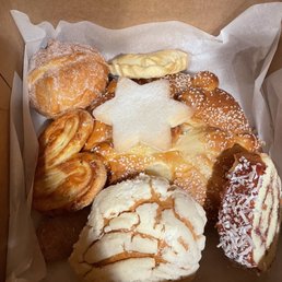 a variety of pastries in a box a variety of pastries in a box