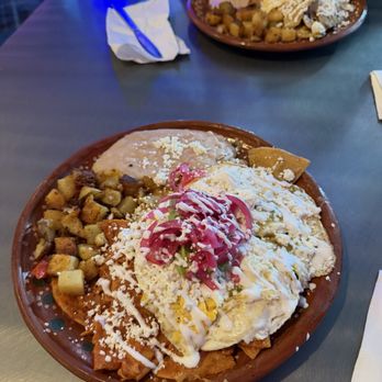Buenos Dias Cafecito - Half red chilaquiles and half green. - Breakfast & Brunch Near Me - Hollister, California Buenos Dias Cafecito - Half red chilaquiles and half green. - Breakfast & Brunch Near Me - Hollister, California