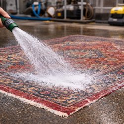 Beverly Hills Rug Cleaning & Repairs - Professional area rug hand washing and rinsing at our Haslet, TX cleaning facility, serving Fort Worth and surrounding DFW areas.
