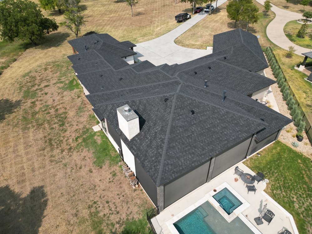 Slide of Compass Roofing