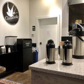 Cinnaholic - Basic drink and utensil station, coffee station, recycling and waste which are conveniently labeled with where to put what specifically. - Desserts Near Me - Seattle, Washington