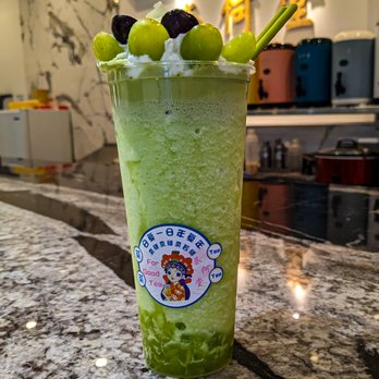 For Good Tea - a green drink with grapes on top - Juice Bars & Smoothies Near Me - Duluth, Georgia