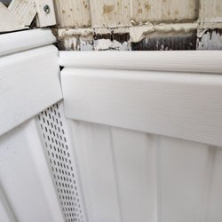 Goodie and Sons - skirting does not align around the building. Paint covered by old skirting exposed.