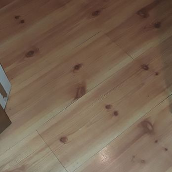 Momentum Tile & Stone - More water damaged pergo floor - Flooring Near Me Momentum Tile & Stone - More water damaged pergo floor - Flooring Near Me