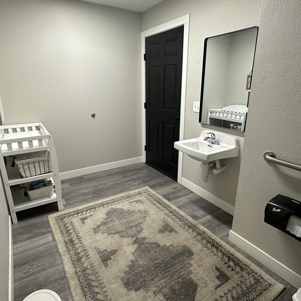 Crossroads Automotive - Customer bathroom with changing table - Auto Repair Near Me - Topeka, Kansas