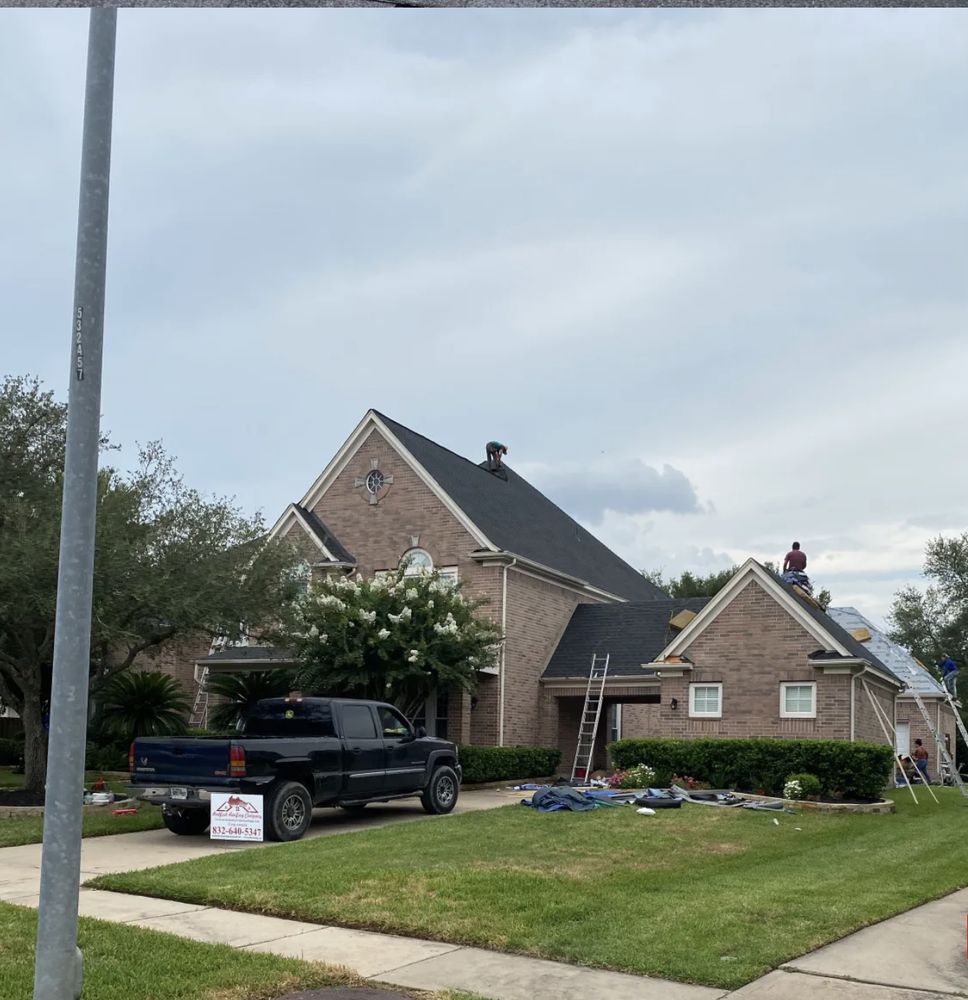 Slide of Redfish Roofing Company