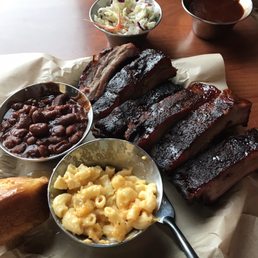1/2 rack of ribs, baked beans, mac n' cheese, & cornbread. So delicious! 1/2 rack of ribs, baked beans, mac n' cheese, & cornbread. So delicious!