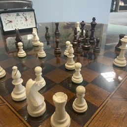 a chess board with chess pieces on it
