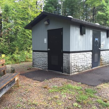 ATV Draper School Campground - Shower house. Two lockable rooms. Lighted. Bench. And a pay timer. $1 for 5 minutes. - Campgrounds Near Me - Winter, Wisconsin